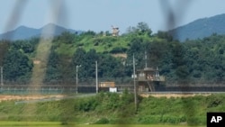 (FILE) A North Korean military guard post and South Korean post are seen from Paju, South Korea.