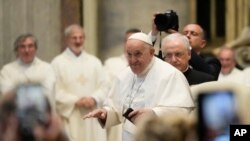 FILE -Pope with pilgrims from Concesio and Sotto il Monte on 60th anniversary of the death of Pope John XXIII and the election of Paul VI in St. Peter's Basilica at Vatican, June 3, 2023.