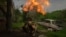 A Ukrainian soldier fires a mortar at Russian positions on the front line near Bakhmut, Donetsk region, Ukraine, May 28, 2023.