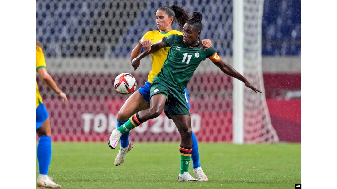 FILE - Brazil's Angelina, back, and Zambia's Barbra Banda battle for the ball during a women's soccer match at the 2020 Summer Olympics, July 27, 2021, in Saitama, Japan.