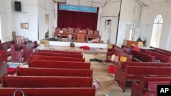 FILE - The interior view of the Malsawm Baptist Church which was reportedly hit by the military's airstrikes and then reportedly occupied by the army troops, is seen in Malsawm village, Hakha township, Chin state, Myanmar, in May 2023.