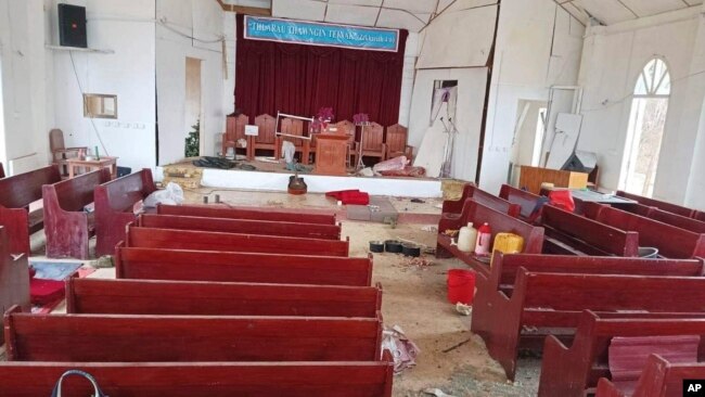 FILE - The interior view of the Malsawm Baptist Church which was reportedly hit by the military's airstrikes and then reportedly occupied by the army troops, is seen in Malsawm village, Hakha township, Chin state, Myanmar, in May 2023.