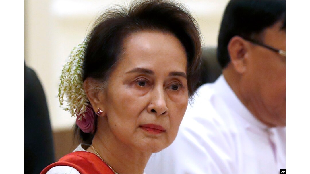 FILE - Myanmar's leader Aung San Suu Kyi, left, in Naypyitaw Myanmar, on Jan. 18, 2020. Thailand’s top diplomat said July 12, 2023, that he met the ousted leader in detention over the weekend and she conveyed her openness to engage in talks to resolve the crisis in her strife-torn nation.