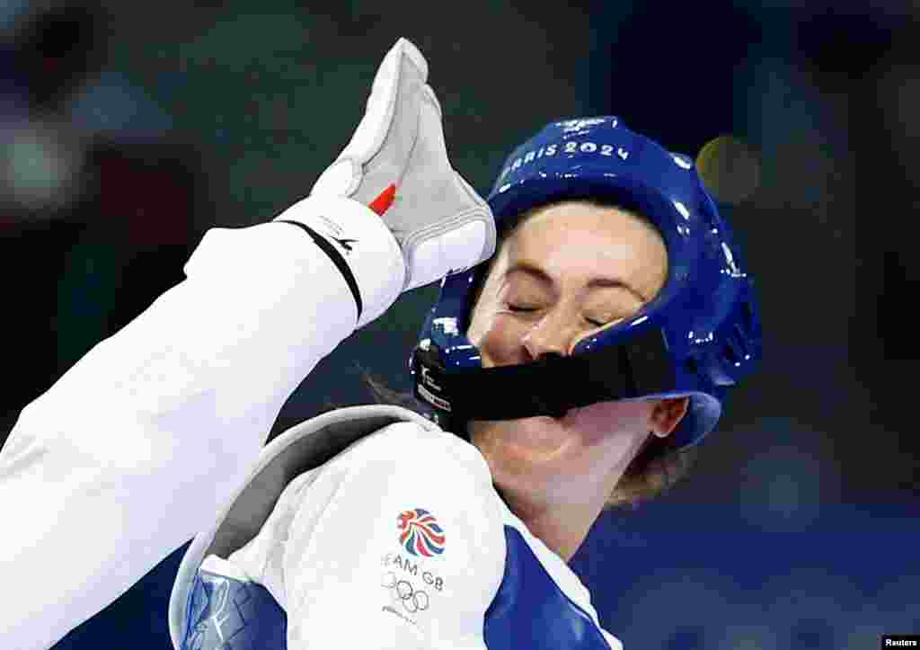 Jade Jones of Britain competes with Miljana Reljikj of North Macedonia in the women 57kg round of taekwondo at the Grand Palais during the Paris 2024 Olympics in Paris.