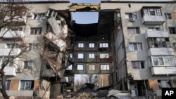 FILE - An apartment building destroyed by Russian forces is seen in Bakhmut, Ukraine, Feb. 24, 2023.