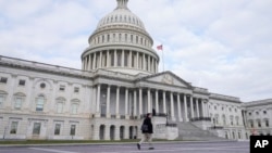 FILE - The U.S Capitol is seen on Jan. 8, 2024, in Washington. A House committee on Jan. 19, 2024, advanced a bill to enhance tax breaks for businesses and low-income families.