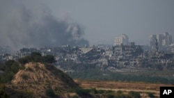 Smoke rises following an Israeli airstrike in the Gaza Strip, as seen from southern Israel, Nov. 3, 2023.