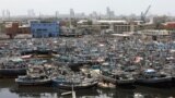 Anchored fishing boats after ban imposed on coastal activities following the Cyclone Biparjoy, over the Arabian Sea, at Karachi's Fish Harbor, in Karachi, Pakistan, June 10, 2023.