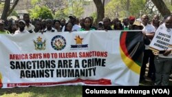 Many Zimbabweans believe sanctions imposed on their leaders by some Western countries are hurting the country's economy. They have been calling for the sanctions' removal with protests such as this one on Oct. 25, 2023 in Harare, Zimbabwe.