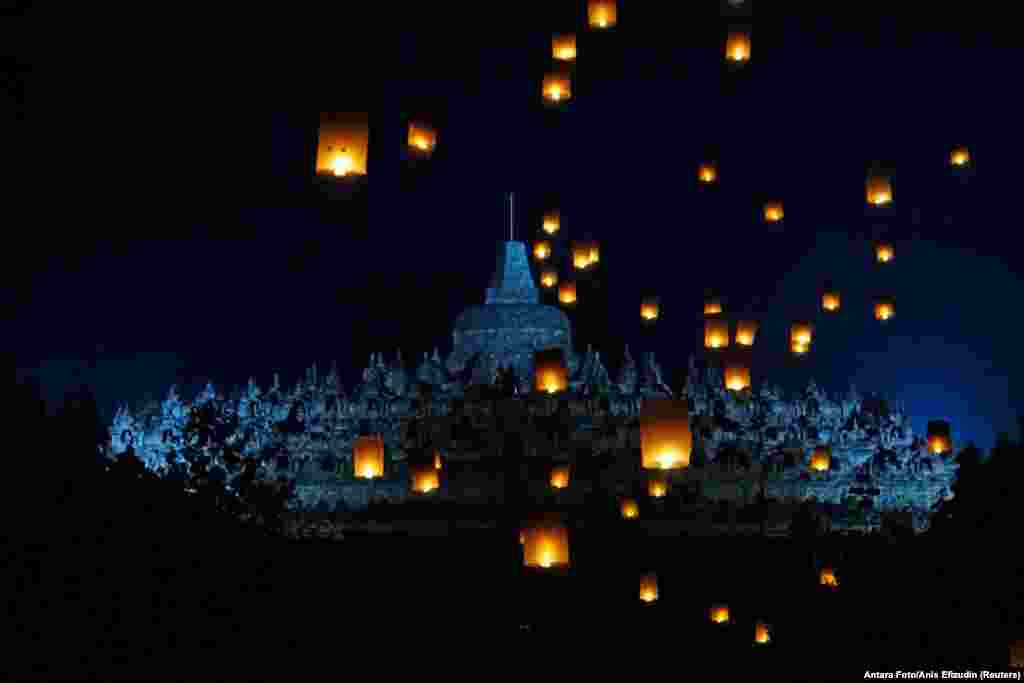 Paper lanterns are seen flying near Borobudur temple during the festival to mark the Vesak Day celebration in Magelang, Central Java province, Indonesia, June 4, 2023.