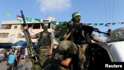 하마스 산하 군사조직 알카삼 여단 병사들이 지난 2015년 가자지구 남부 라파에서 반이스라엘 행진에 참가하고 있다. (자료사진)