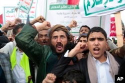 Houthi supporters in Sanaa attend a rally in support of the Palestinians in the Gaza Strip, and against the U.S. government designating the Houthis as a terror group on January 19, 2024. (Osamah Abdulrahman/AP)