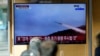 2024年1月24日，韩国首尔火车站的电视新闻节目中播放的朝鲜巡航导弹的档案镜头。（美联社照片）
