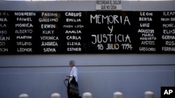 FILE - The names of people who died in the bombing of the AMIA Jewish center are on display at the site of the attack in Buenos Aires, Argentina, Jan. 23, 2024.
