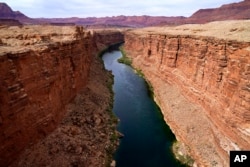 FILE - The Colorado River is pictured in Lees Ferry, Arizona, May 29, 2021.