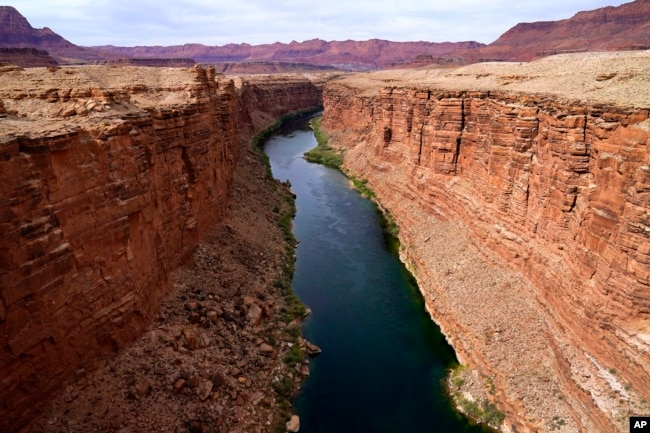 FILE - The Colorado River in the upper River Basin is pictured in Lees Ferry, Arizons, May 29, 2021.