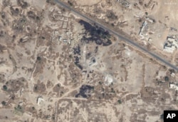 This Jan. 12, 2024, satellite image provided by Maxar Technologies shows damage from airstrikes on a radar site at Sanaa Airport in Yemen.