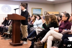 FILE - High school student Leo Burchell speaks at the Central Bucks School Board meeting about LGBTQ student rights in Doylestown, Pa., on Tuesday, Nov. 15, 2022. (AP Photo/Ryan Collerd)