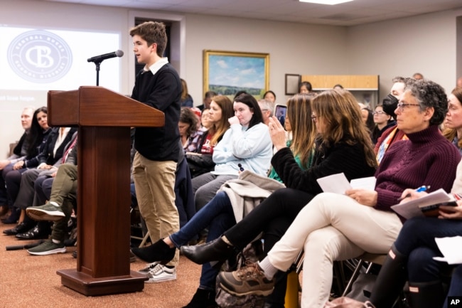 FILE - High school student Leo Burchell speaks at the Central Bucks School Board meeting about LGBTQ student rights in Doylestown, Pa., on Tuesday, Nov. 15, 2022. (AP Photo/Ryan Collerd)