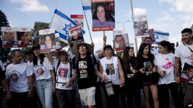 Families of hostages held by Hamas in the Gaza Strip since Oct. 7 and their supporters march from Tel Aviv to Jerusalem in Ramle, Israel, Nov. 15, 2023.