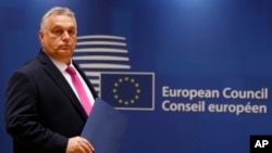 FILE - Hungarian Prime Minister Viktor Orban arrives for a meeting at an EU summit in Brussels, Oct. 26, 2023.