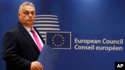 FILE - Hungary's Prime Minister Viktor Orban arrives for a meeting at an EU summit in Brussels on Oct. 26, 2023. Orban said on Nov. 10, 2023, that he does not support moving forward on negotiations on Ukraine's future membership in the EU.