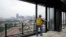 A worker opens the windows on the top floor of the new Godfrey Hotel, in Detroit, June 27, 2023.