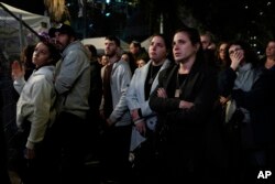 People attend a 24-hour rally calling for the release of the hostages kidnapped by Hamas militants into the Gaza Strip, in Tel Aviv, Israel, Jan. 14, 2024. Sunday marked 100 days of war between Israel and Hamas.