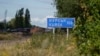 A sign for Kursk is seen on the Russian-Ukrainian border in Sumy region, Ukraine, Aug. 13, 2024.