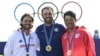 (From L) Silver medalist Britain's Thomas Fleetwood, gold medalist US' Scottie Scheffler and bronze medalist Japan's Hideki Matsuyama pose for pictures after round 4 of the men's golf individual stroke play of the Paris 2024 Olympic Games, Aug. 4, 2024.