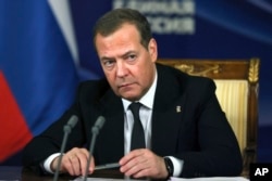 FILE - Russian Security Council Deputy Chairman and the head of the United Russia party Dmitry Medvedev attends a meeting at the Gorki residence, outside Moscow, Russia, Nov. 14, 2023.