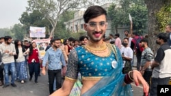 A participant of the Delhi Queer Pride Parade poses for a photograph during the march in New Delhi, India, Nov. 26, 2023.