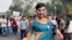 A participant of the Delhi Queer Pride Parade poses for a photograph during the march in New Delhi, India, Nov. 26, 2023.