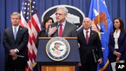 Attorney General Merrick Garland speaks with reporters during a news conference at the Department of Justice, in Washington, Dec. 6, 2023.