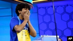 Dev Shah, 14, from Largo, Fla., reacts as he wins the Scripps National Spelling Bee finals, Thursday, June 1, 2023, in Oxon Hill, Md. 