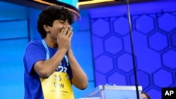 Dev Shah, 14, from Largo, Fla., reacts as he wins the Scripps National Spelling Bee finals, Thursday, June 1, 2023, in Oxon Hill, Md. (AP Photo/Nick Wass)