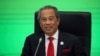 FILE: Perdana Menteri Malaysia Muhyiddin Yassin menyampaikan pidato pembukaan Pertemuan Pemimpin Ekonomi APEC 2020 virtual, di Kuala Lumpur, Malaysia 20 November 2020. (REUTERS/Lim Huey Teng)