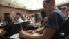 US University President's Resignation Spurs Freedom of Speech Debate on Campuses 