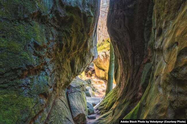 FILE - Split stone rock, inside view. Ternoshorskaya Lada. Dovbush Rocks. Carpathians, Kosiv district, Ivano-Frankivsk region, Ukraine (Adobe Stock Photo by Volodymyr)