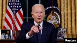 PRésident Joe Biden ya eklo Amerika azali kosala lisikulu mpo bitumba na Israel na Ukraine, Washington D.C., 19 sanza ya zomi 2023.