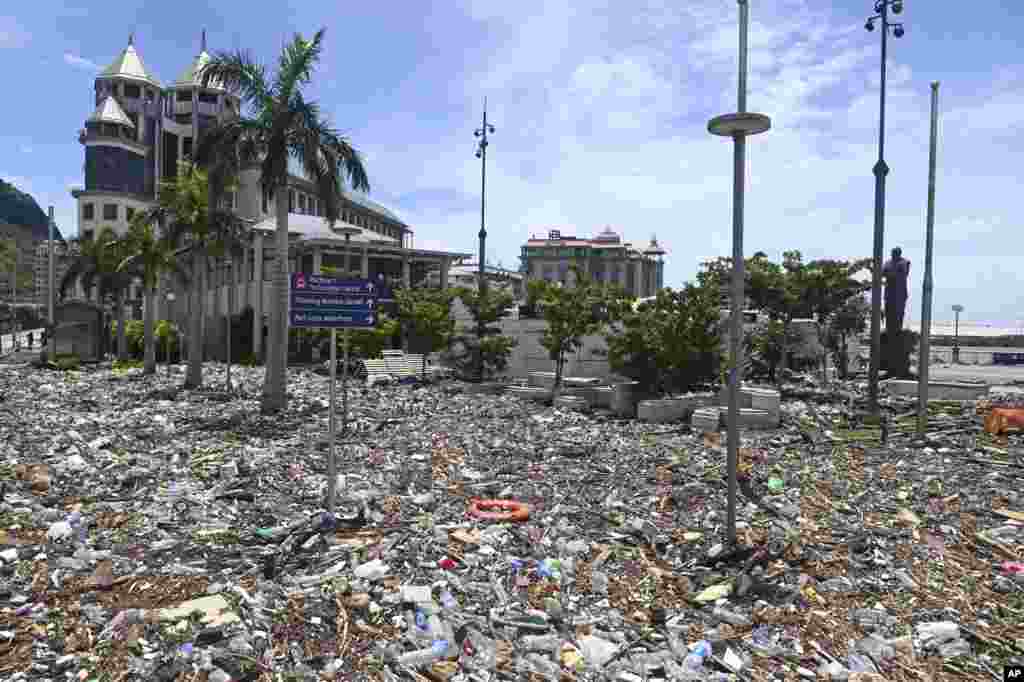 Debris washed up during the cyclone is strewn across the Caudan Waterfront in Port Louis, the capital city of Mauritius.&nbsp;Mauritius lifted its highest weather alert and eased a nationwide curfew after a cyclone battered the Indian Ocean island, causing heavy flooding and extensive damage in the capital city and other parts of the country.