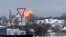 Image capture from a video showing flames rising at the scene of a Russian military transport plane that crashed near Yablonovo, Belgorod region, Russia, on January 24, 2024. (Validated UGC video/AP)