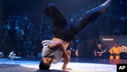 FILE - Victor Montalvo, also known as B-Boy Victor, of the United States competes in the B-boy Red Bull BC One World Final at Hammerstein Ballroom, in New York, Nov. 12, 2022.