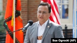 FILE - In this Aug. 22, 2019, photo, Cherokee Nation Principal Chief Chuck Hoskin Jr. speaks during a news conference in Tahlequah, Okla. 