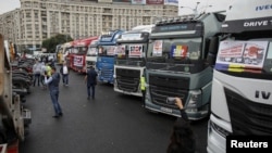 FILE - Romanian truckers are seen protesting in front of government buildings in Bucharest, Romania, Sept. 29, 2021. (Inquam Photos/Octav Ganea via Reuters)