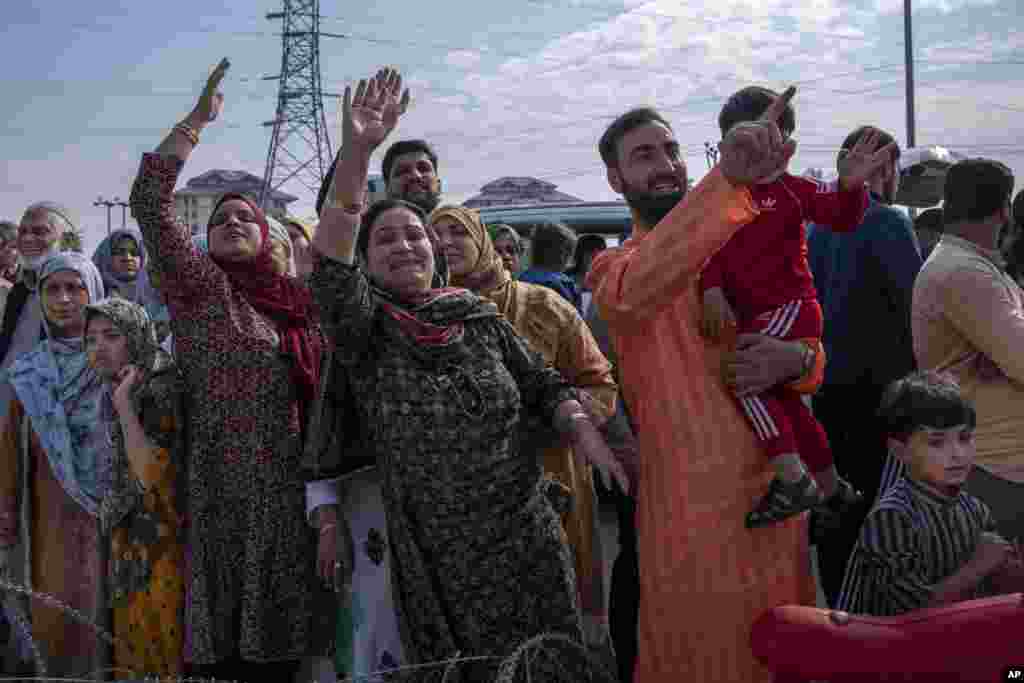 Kashmiri Muslims wave their relatives leaving for the holy city of Mecca for the annual Hajj pilgrimage in Srinagar, Indian-controlled Kashmir.