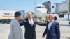 Austrian foreign minister Alexander Schallenberg, center, welcomes Kamran Ghaderi, right, and Massud Mossaheb June 3, 2023, at the Vienna airport. (Photo by Karl Schober / Austrian Interior Ministry / AFP)