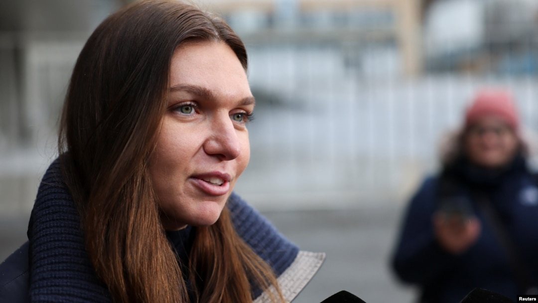 FILE - Tennis player Simona Halep of Romania speaks to the media, after a hearing for a doping case against her, at the Court of Arbitration for Sport (CAS) in Lausanne, Switzerland, Feb. 9, 2024. 