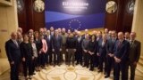 Ukrainian President Volodymyr Zelenskyy, center, poses for a photo with participants of an informal EU Foreign Ministers meeting in Kyiv, Oct. 2, 2023.