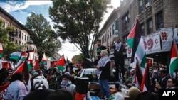 People rally in support of Palestinians in Brooklyn, New York on October 21, 2023, amid ongoing conflict between Israel and Hamas. 